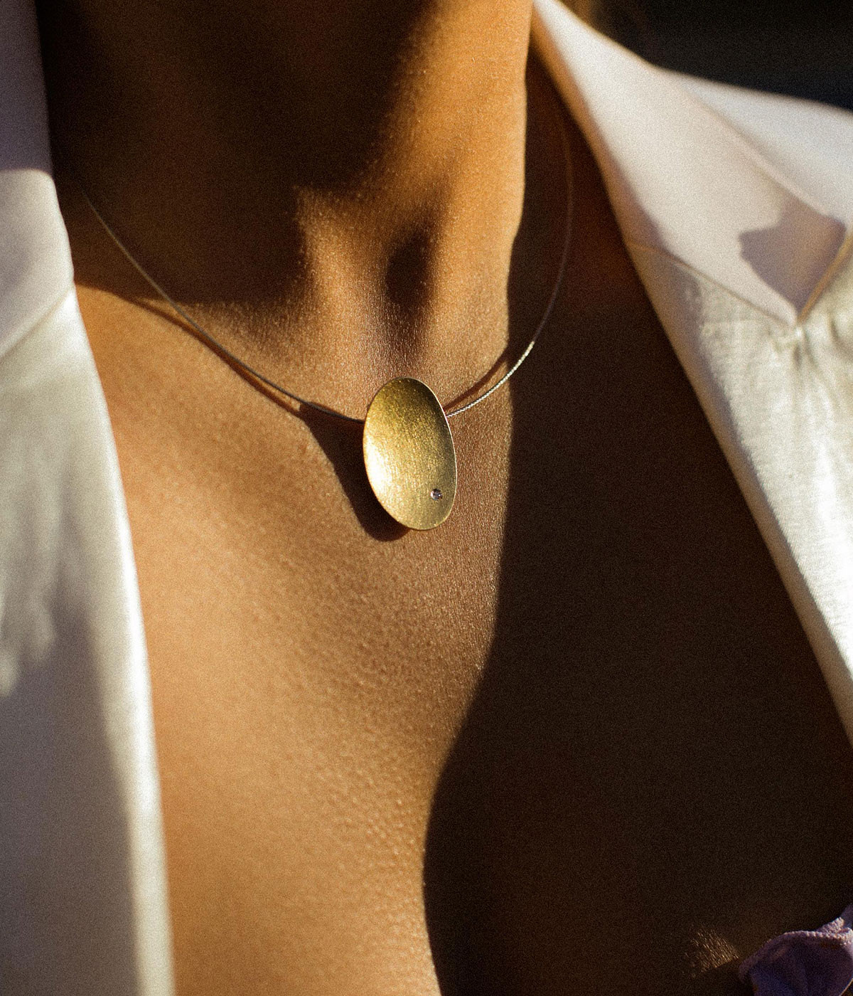 Oval Kumboo pendant with brilliant