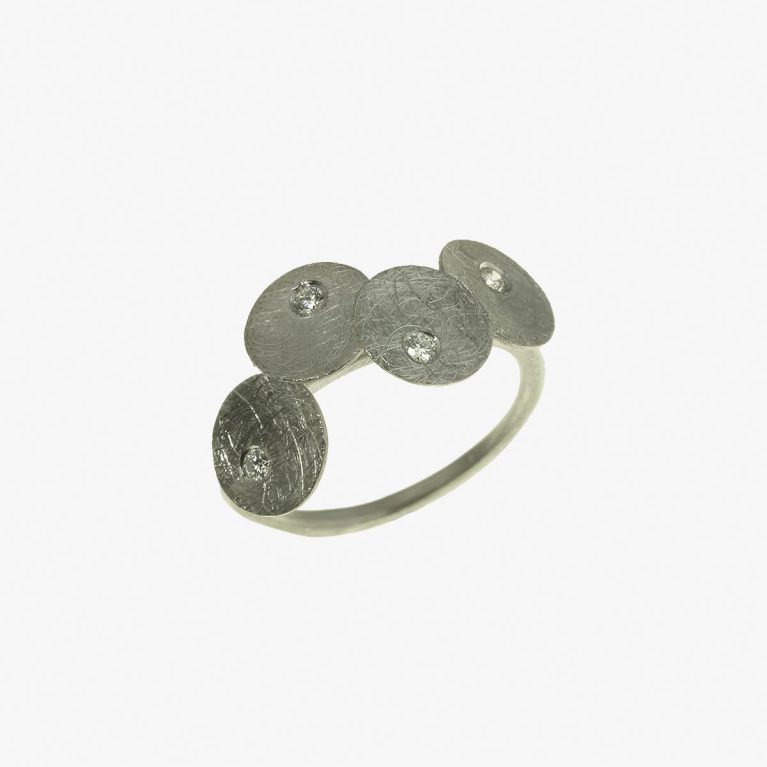 Anillo Flô 4p oro blanco