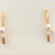 Pendientes de acero con baño de oro y perlas